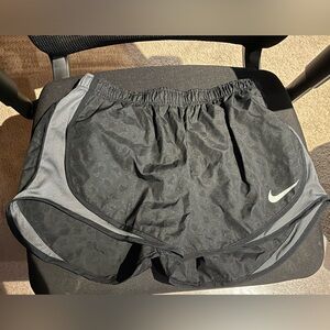 Nike dri fit shorts. Black leopard print size medium